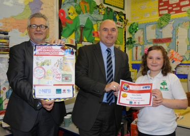 Local Assembly Member Paul Davies has visited Ysgol Llanychllwydog in Pontfaen, to present nine-year old Cerys Davies with a prize for winning the National Federation of Builders' 2012 "Stay Safe, Stay Away" poster competition, for the whole of Wales